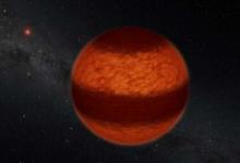 科学家发现在褐矮星上划过的云带